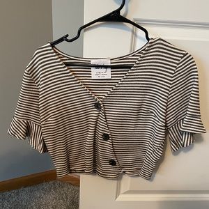 This cute tee is from Dry Goods! The brand is Sadie x Saige.